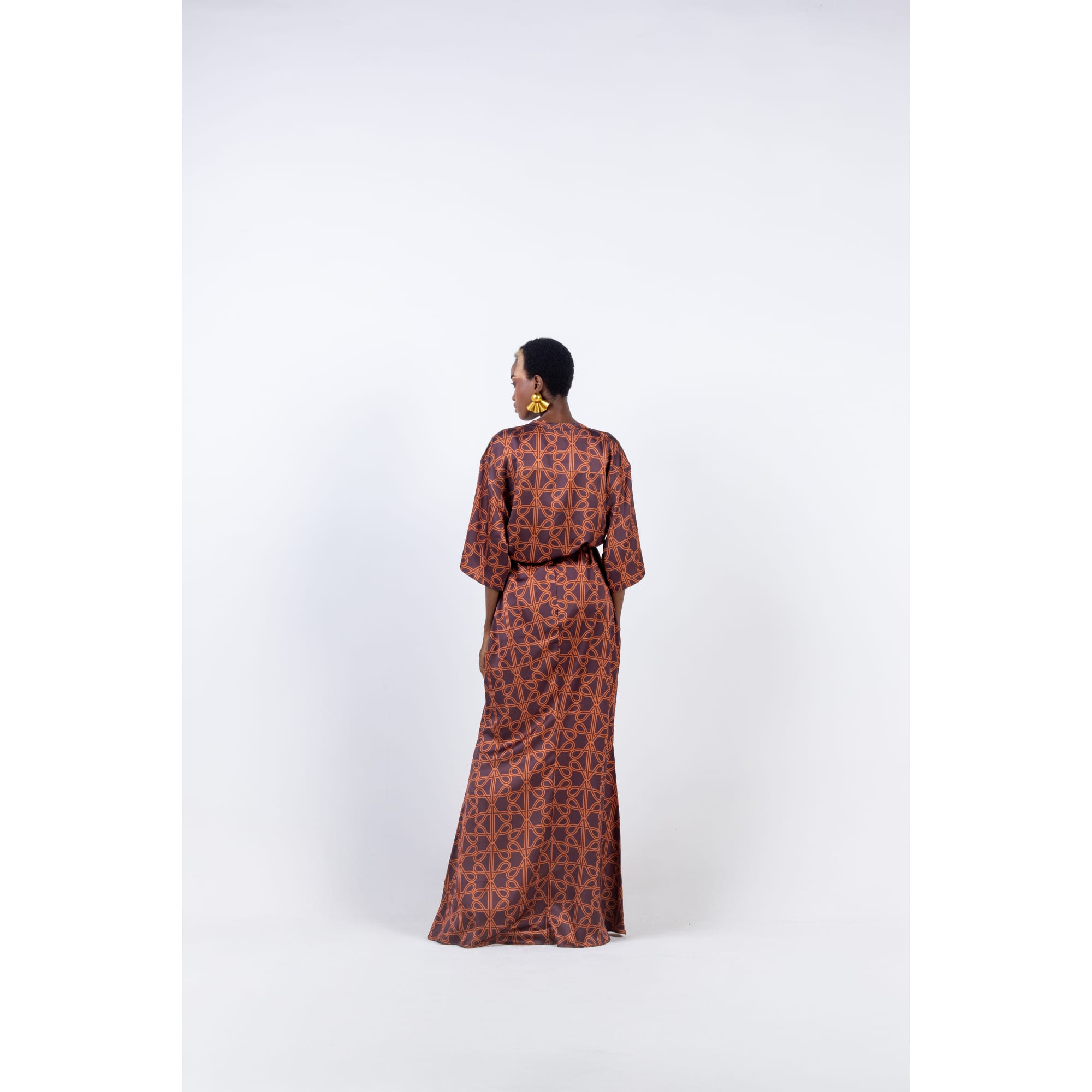 22c. Brown print silk t-shirt. Brown print silk skirt